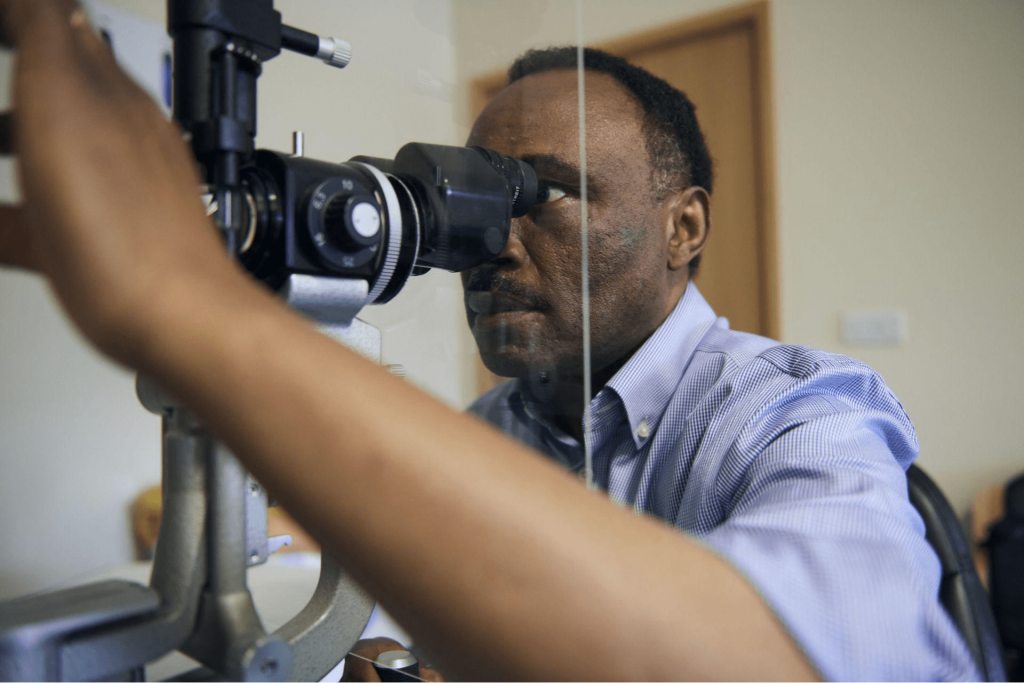 Doctor checking patient's eye health 