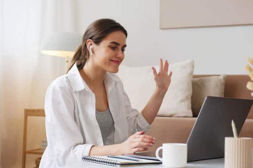 A woman speaks during a video interview